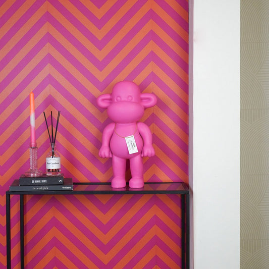 Ornament Aap 'de legende' polyresin roze 33x21x50cm
